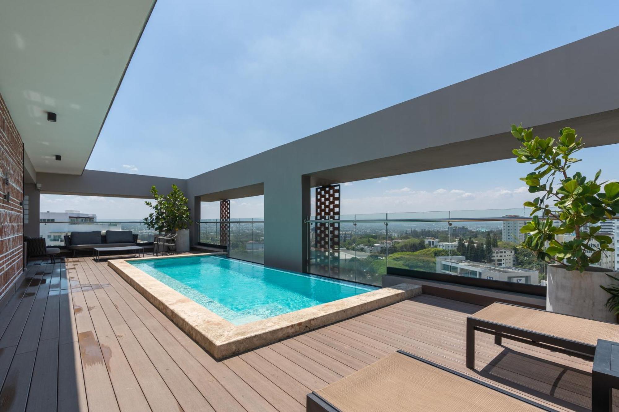 Modern Luxury Condo With Rooftop Pool & Gym Сантьяго-де-лос-Кабальерос Экстерьер фото